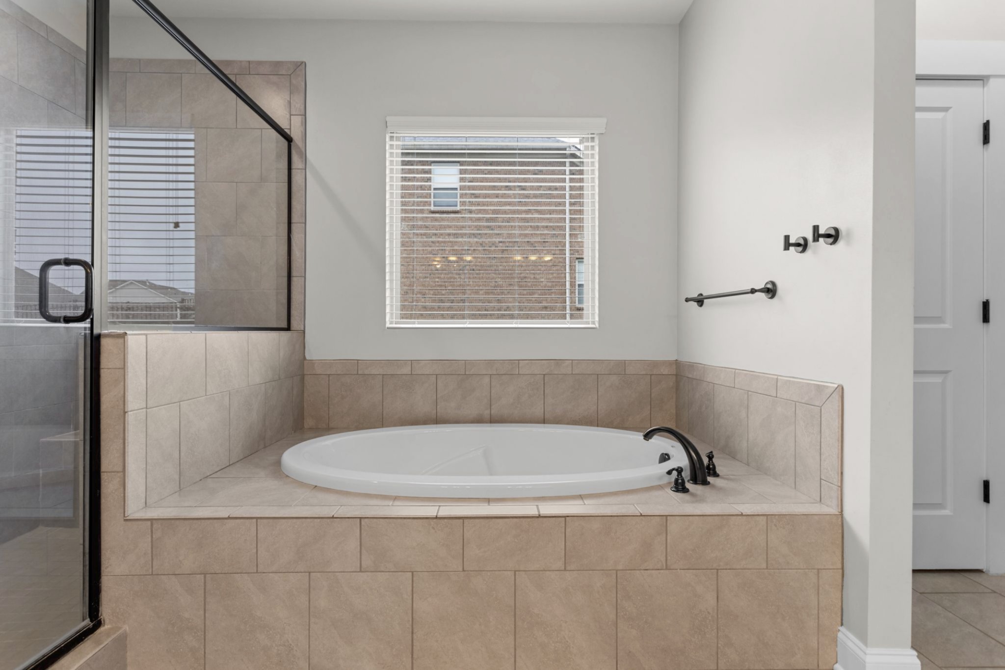 6091 Kidman Lane Spring Hill, TN 37174 - Photo 21 of 43 a white bath tub sitting next to a window