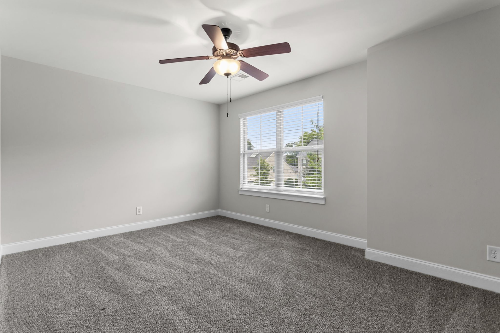 6091 Kidman Lane Spring Hill, TN 37174 - Photo 25 of 43 an empty room with ceiling fan and windows