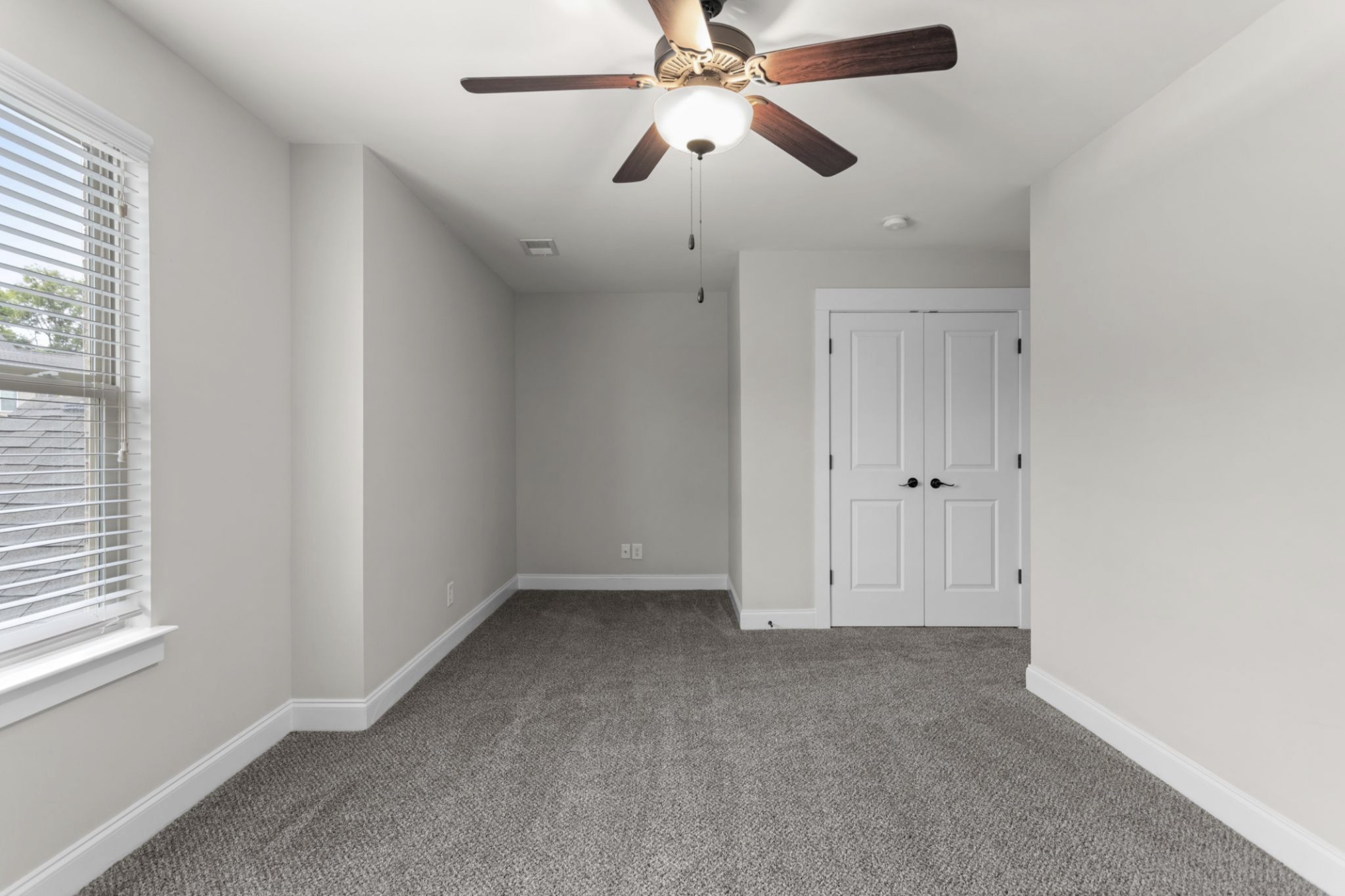 6091 Kidman Lane Spring Hill, TN 37174 - Photo 26 of 43 an empty room with a window and a fan