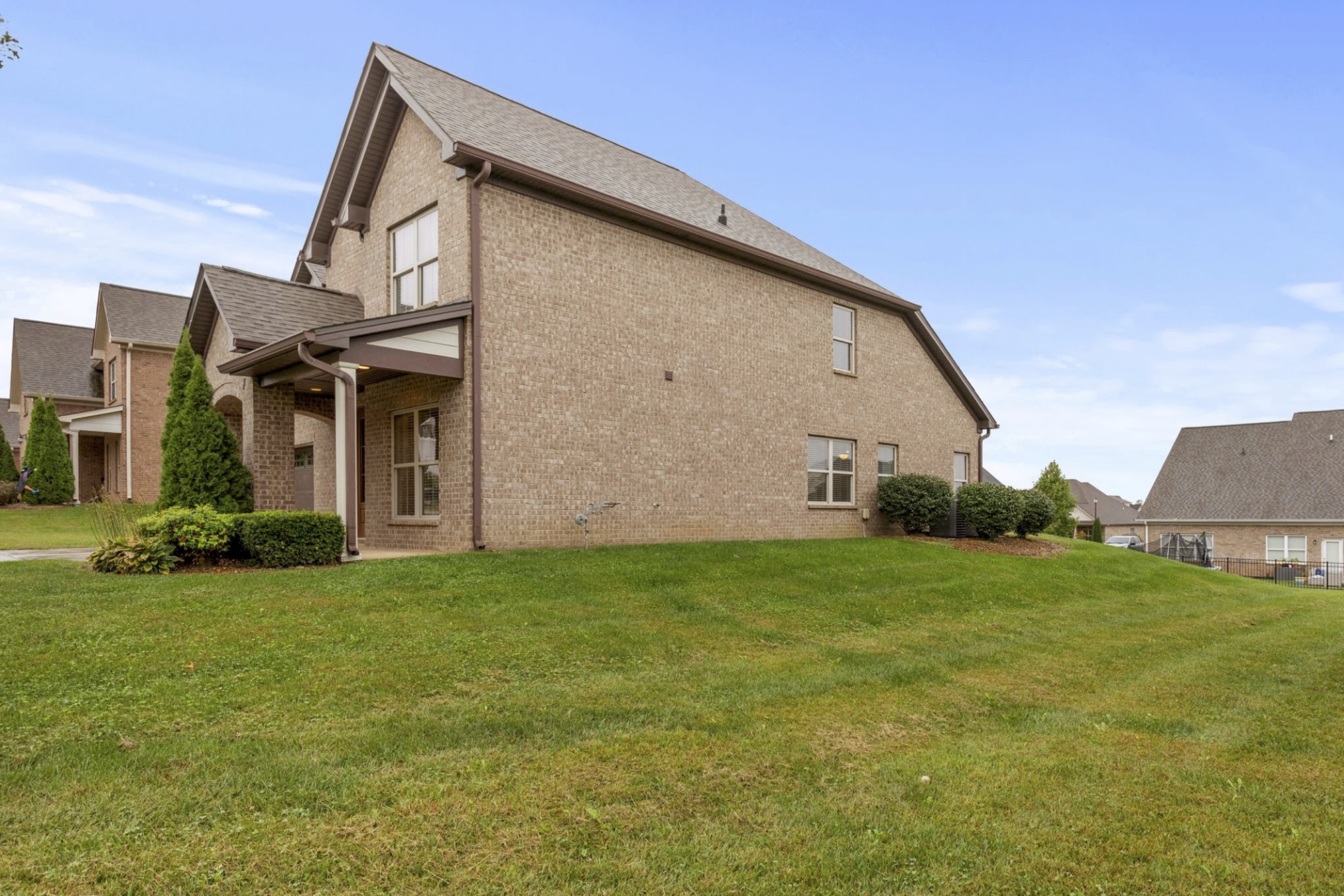 6091 Kidman Lane Spring Hill, TN 37174 - Photo 42 of 43 a front view of a house with a yard