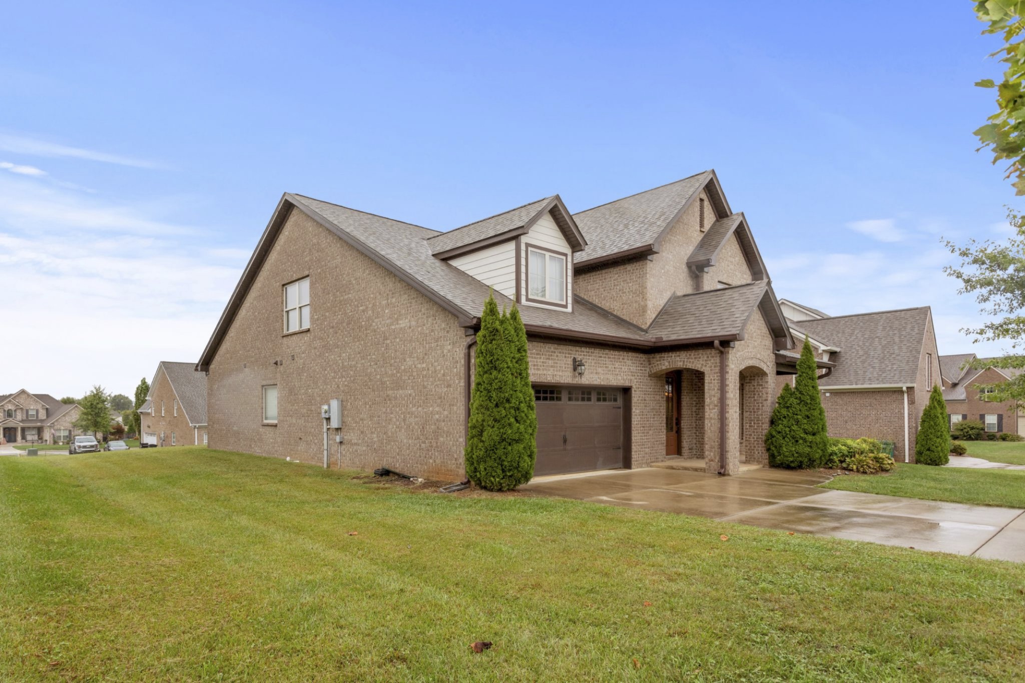 6091 Kidman Lane Spring Hill, TN 37174 - Photo 43 of 43 a view of a house with a yard
