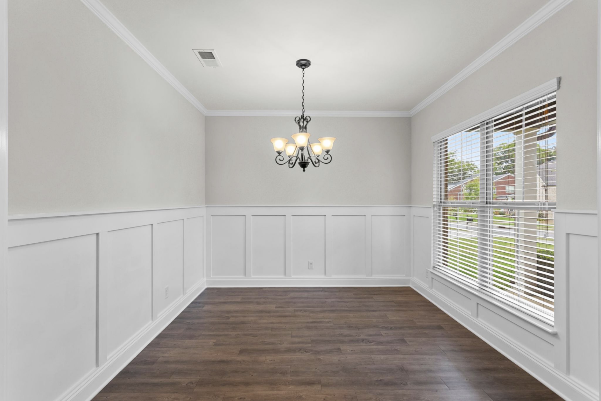 6091 Kidman Lane Spring Hill, TN 37174 - Photo 5 of 43 a view of a chandelier in wooden floor