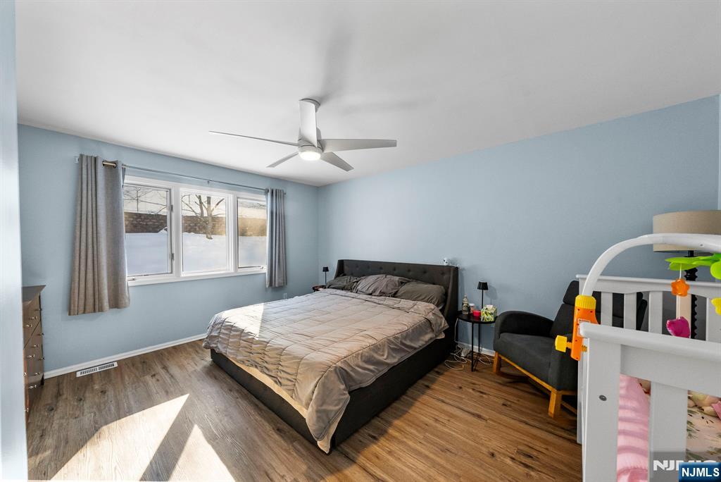 23 Bayowski Road, Unit 149 West Orange, NJ 07052 - Photo 30 of 38 a bedroom with a bed and a window