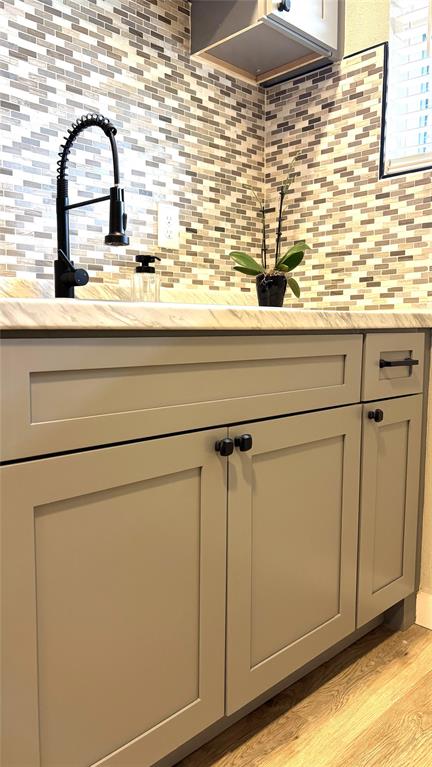 4603 Junius Street, Unit 9 Dallas, TX 75246 - Photo 5 of 9 a close view of sink and tap