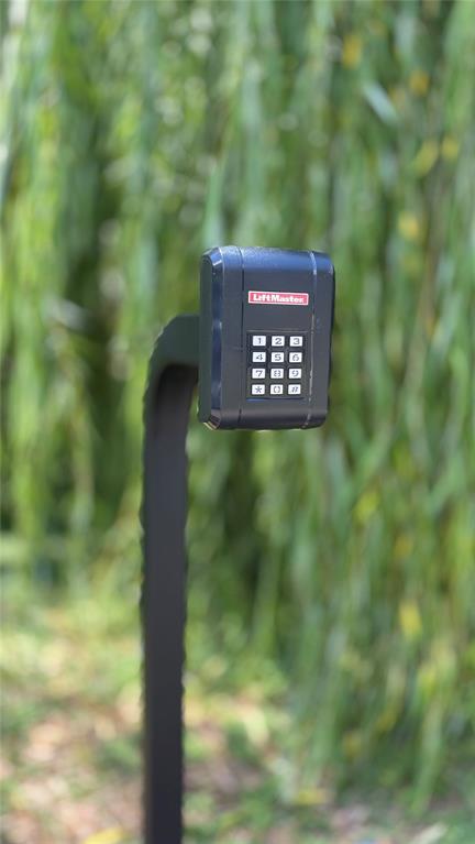 4603 Junius Street, Unit 9 Dallas, TX 75246 - Photo 9 of 9 a sign that is sitting in a forest
