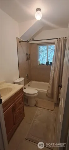 a view of a livingroom with chairs