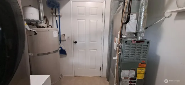 a view of a house with pool and garden