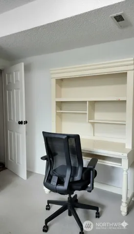 a view of a balcony with wooden floor