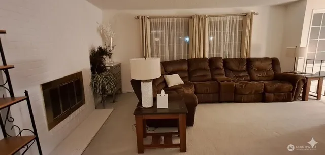 a kitchen with stainless steel appliances granite countertop a refrigerator stove and sink