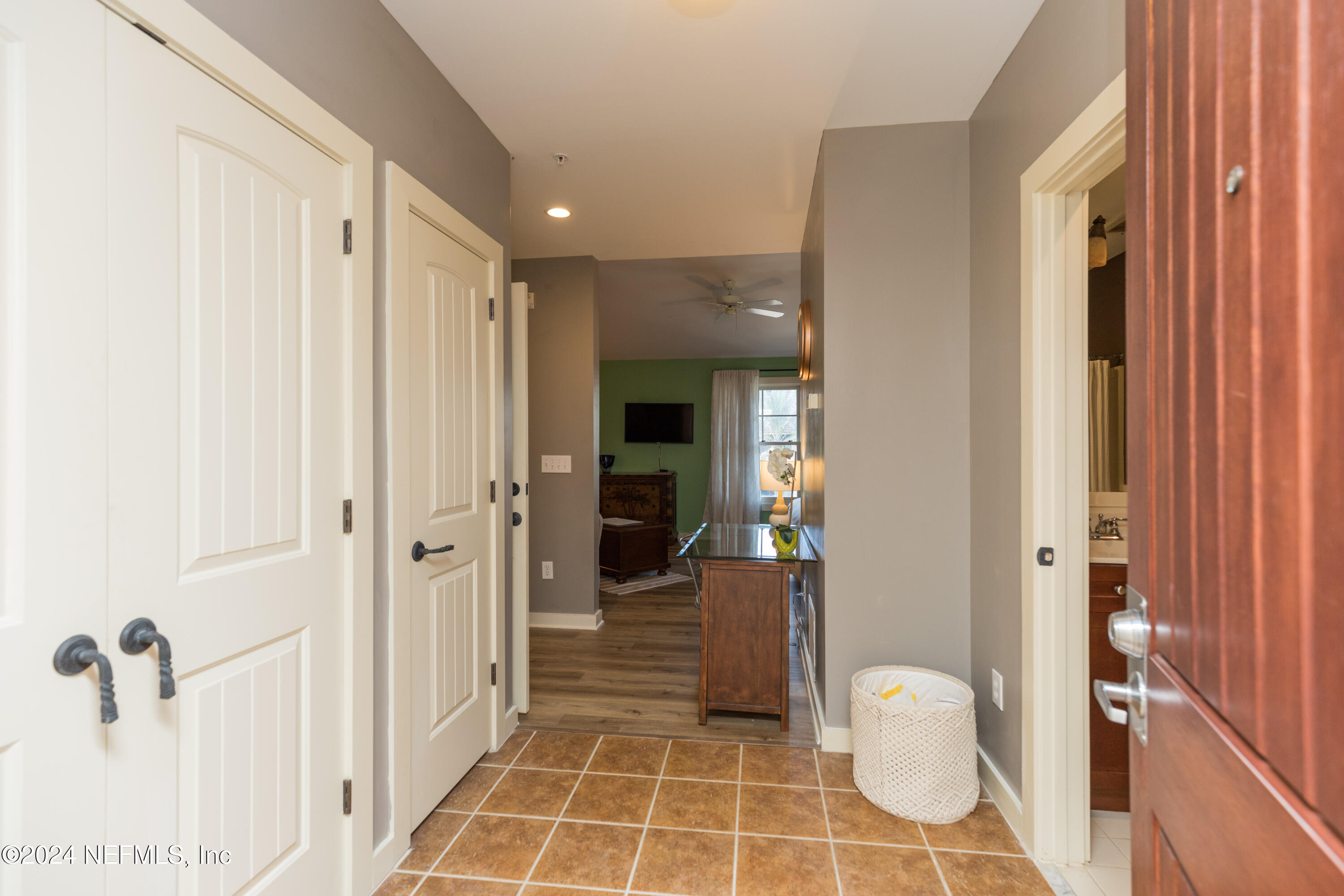 955 Registry Boulevard, Unit 308 St. Augustine, FL 32092 - Photo 32 of 55 a bathroom with a glass door shower