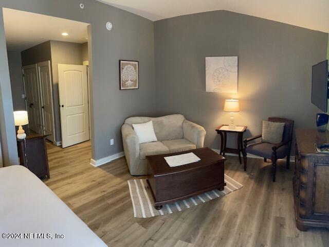 955 Registry Boulevard, Unit 308 St. Augustine, FL 32092 - Photo 7 of 55 a bedroom with furniture and a rug