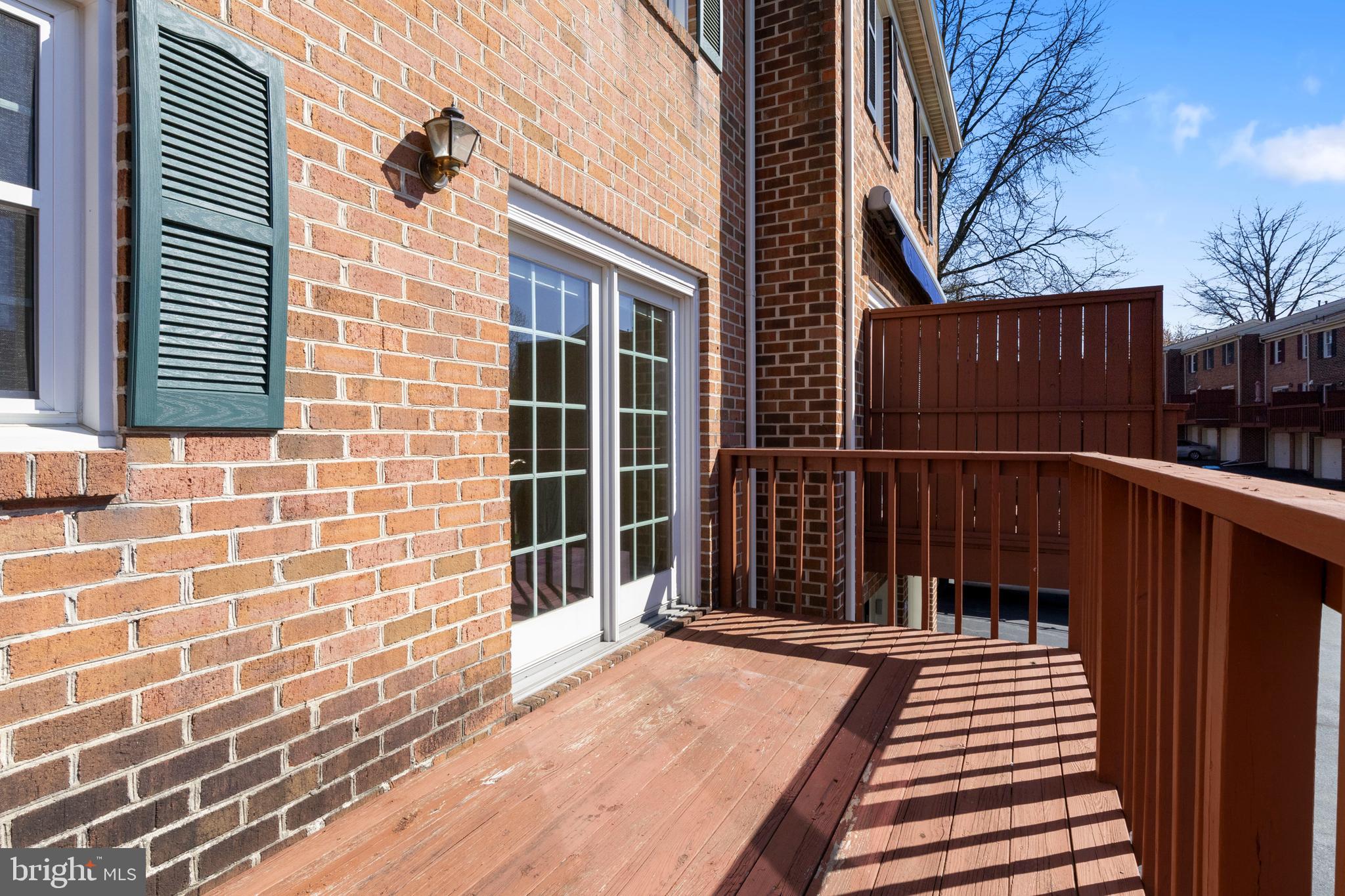 503 Chambers Ridge York, PA 17402 - Photo 13 of 34 a backyard of a house with wooden fence and large windows