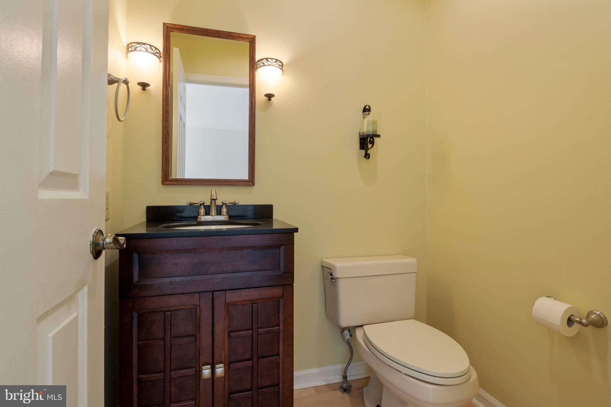 503 Chambers Ridge York, PA 17402 - Photo 15 of 34 a bathroom with a granite countertop toilet sink and mirror