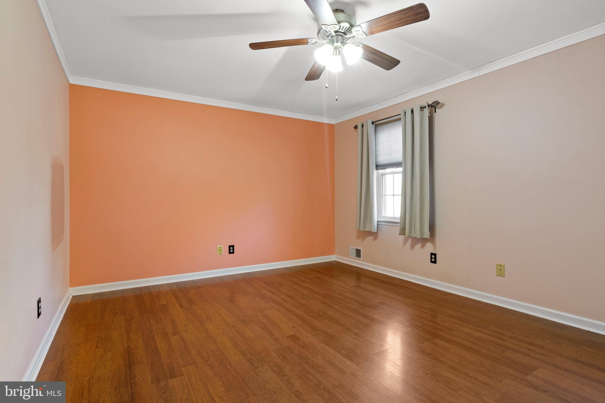 503 Chambers Ridge York, PA 17402 - Photo 21 of 34 an empty room with wooden floor fan and windows