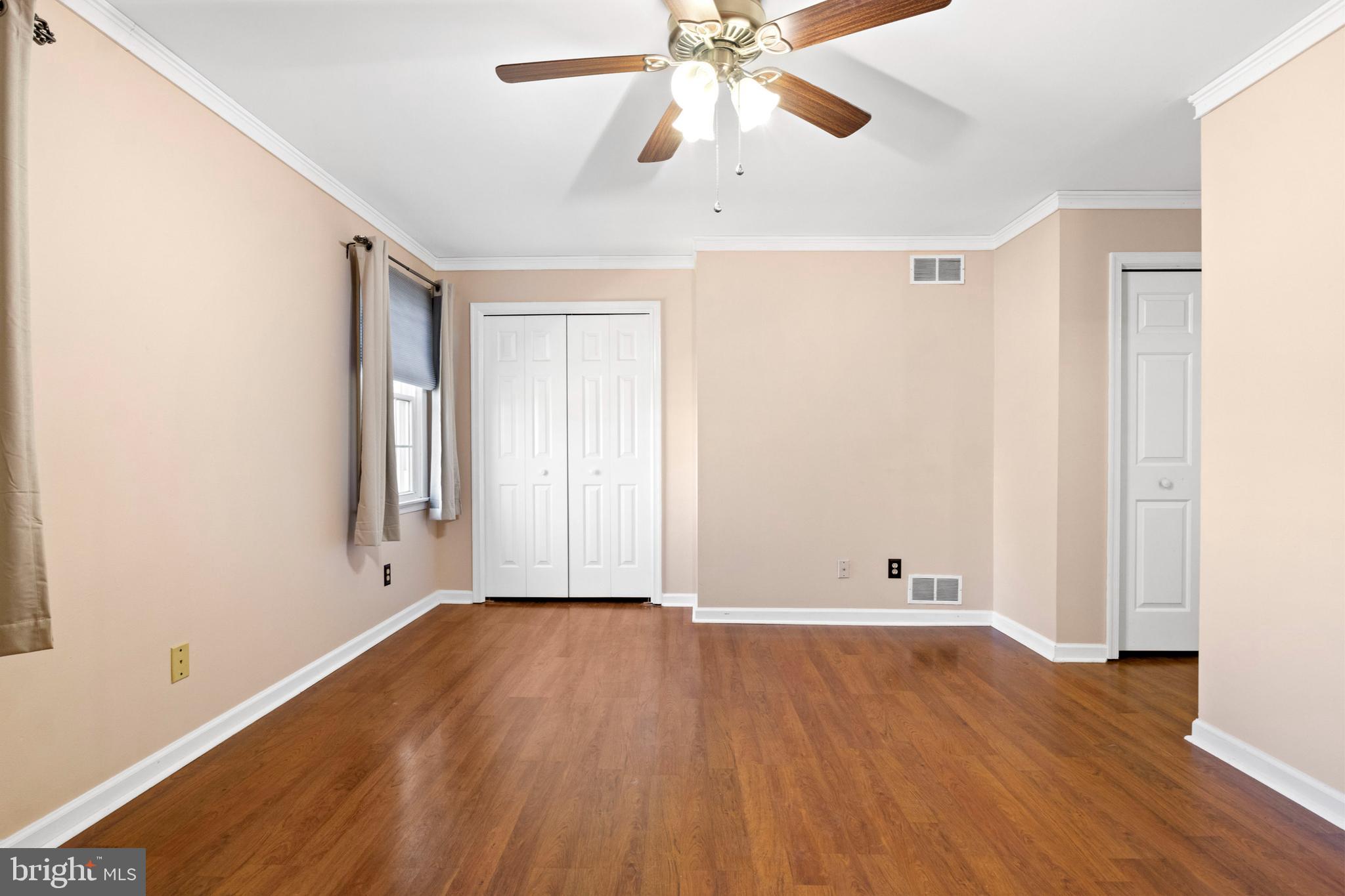 503 Chambers Ridge York, PA 17402 - Photo 22 of 34 wooden floor in an empty room with a window