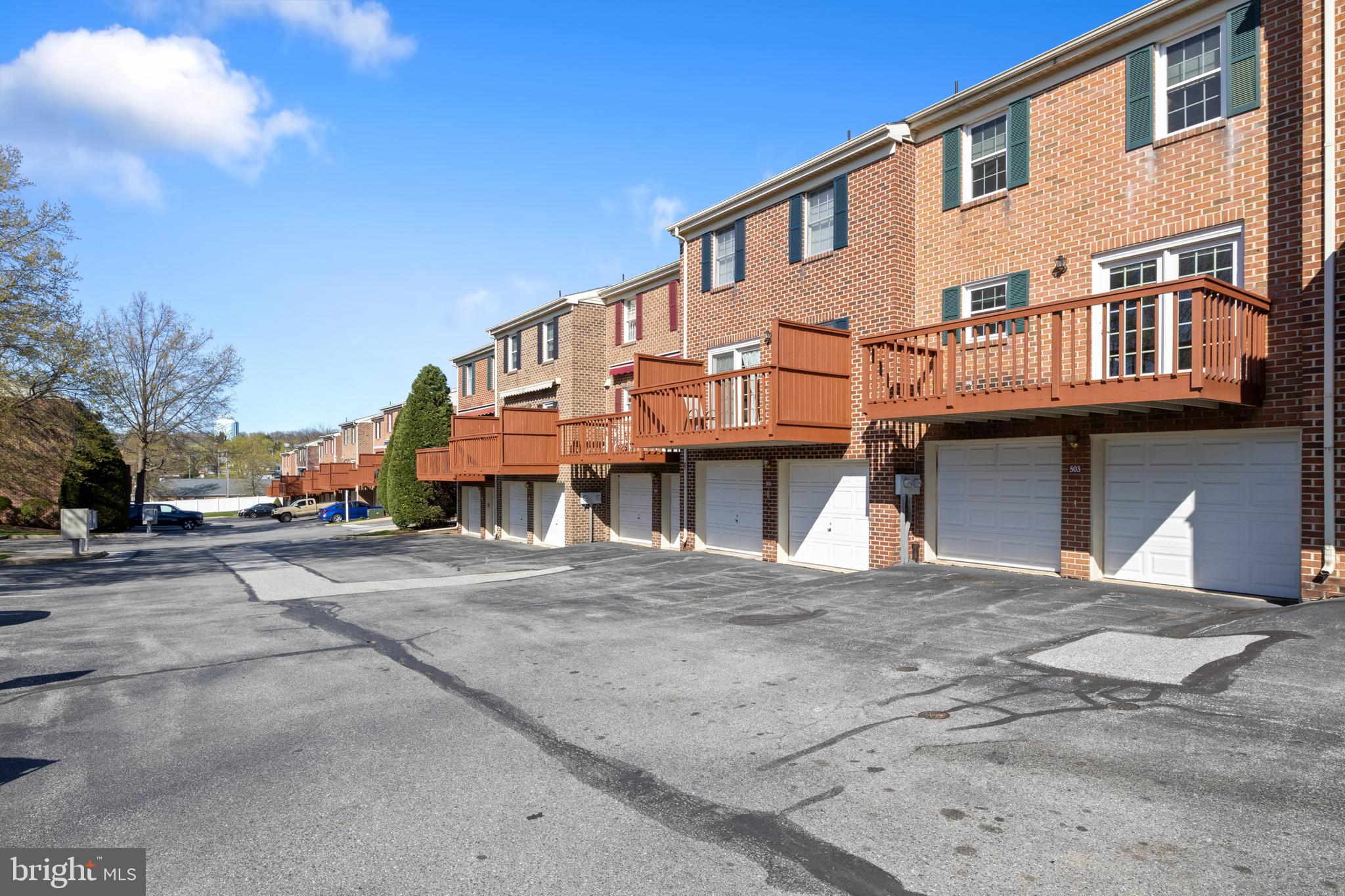 503 Chambers Ridge York, PA 17402 - Photo 29 of 34 a large building with a street