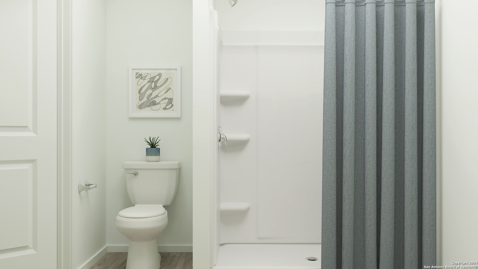746 Thea Meadows Marion, TX 78124 - Photo 18 of 21 a white toilet sitting next to a bathroom sink