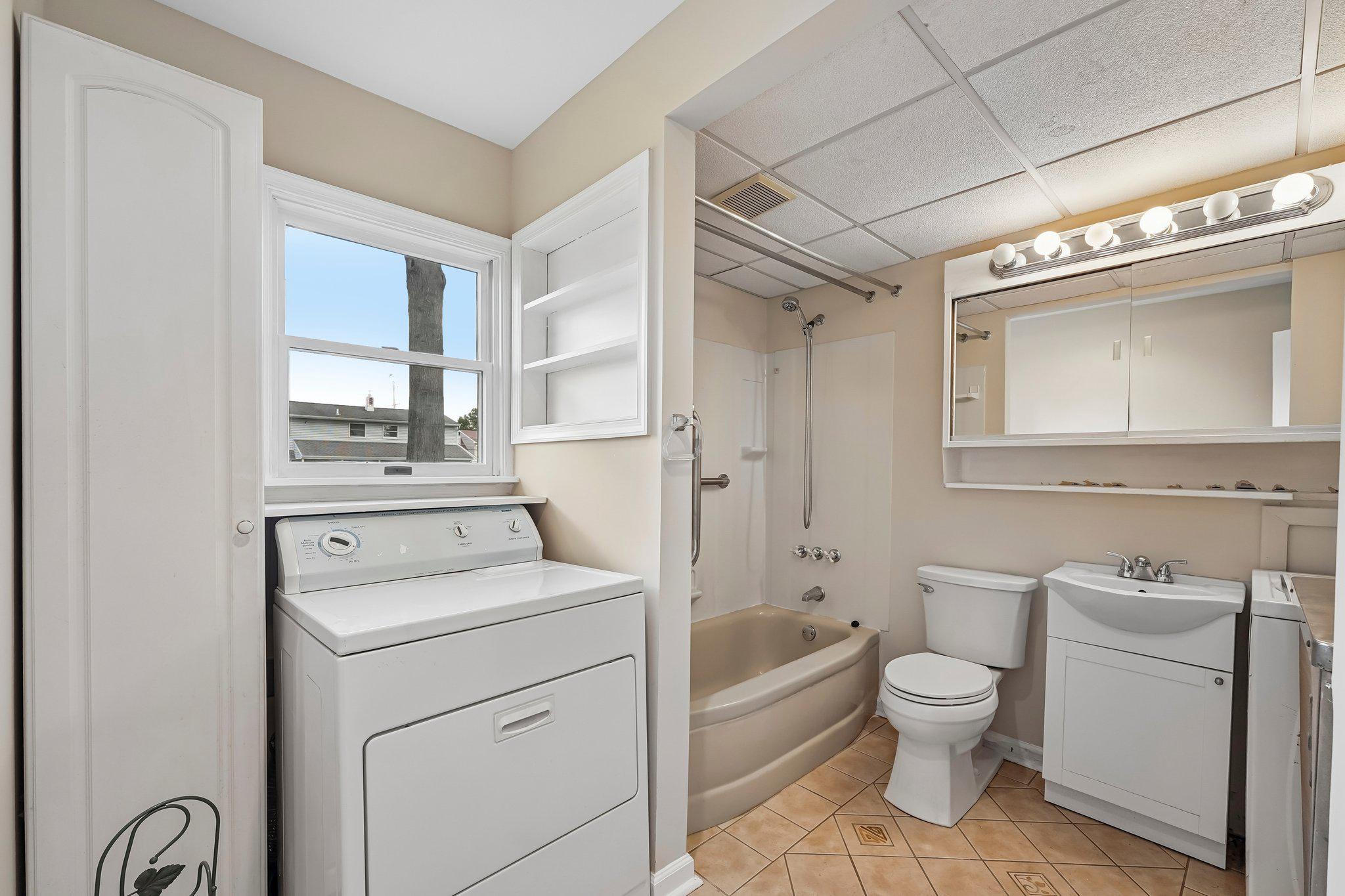 9 Rustleaf Lane Levittown, PA 19055 - Photo 9 of 45 Main floor Bathroom and Laundry