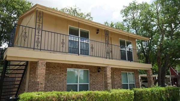 a front view of a house with balcony