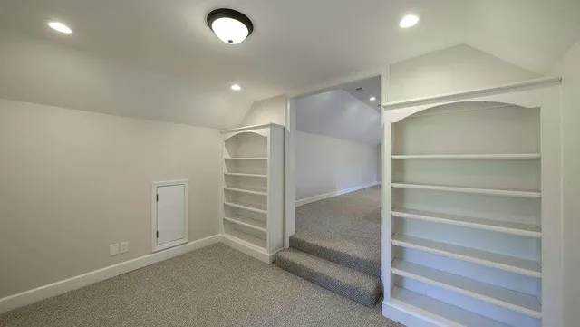 a view of an empty walk in closet