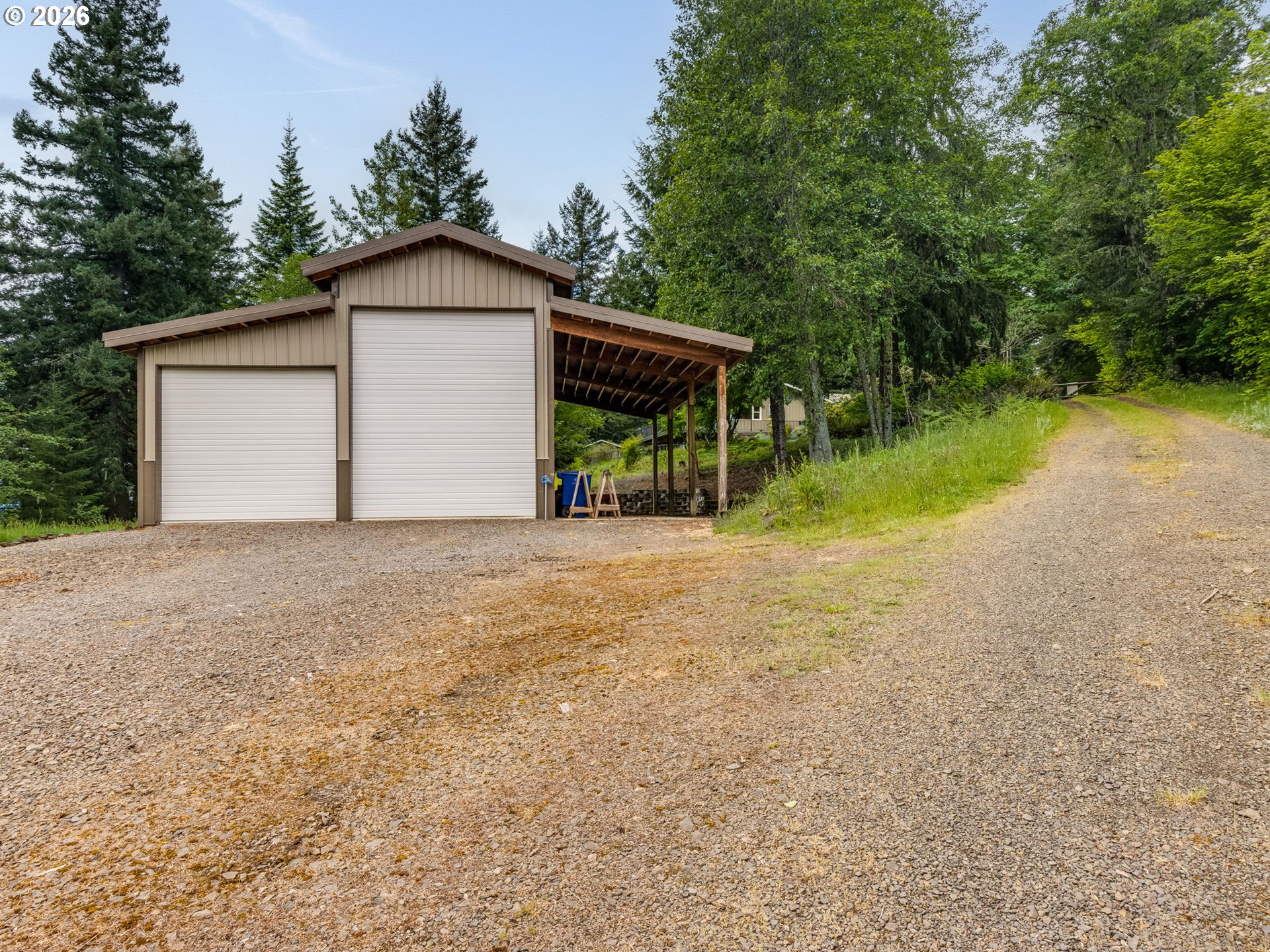 48140 Southeast Linhart Butte Road Sandy, OR 97055 - Photo 42 of 47 a front view of house with yard and green space
