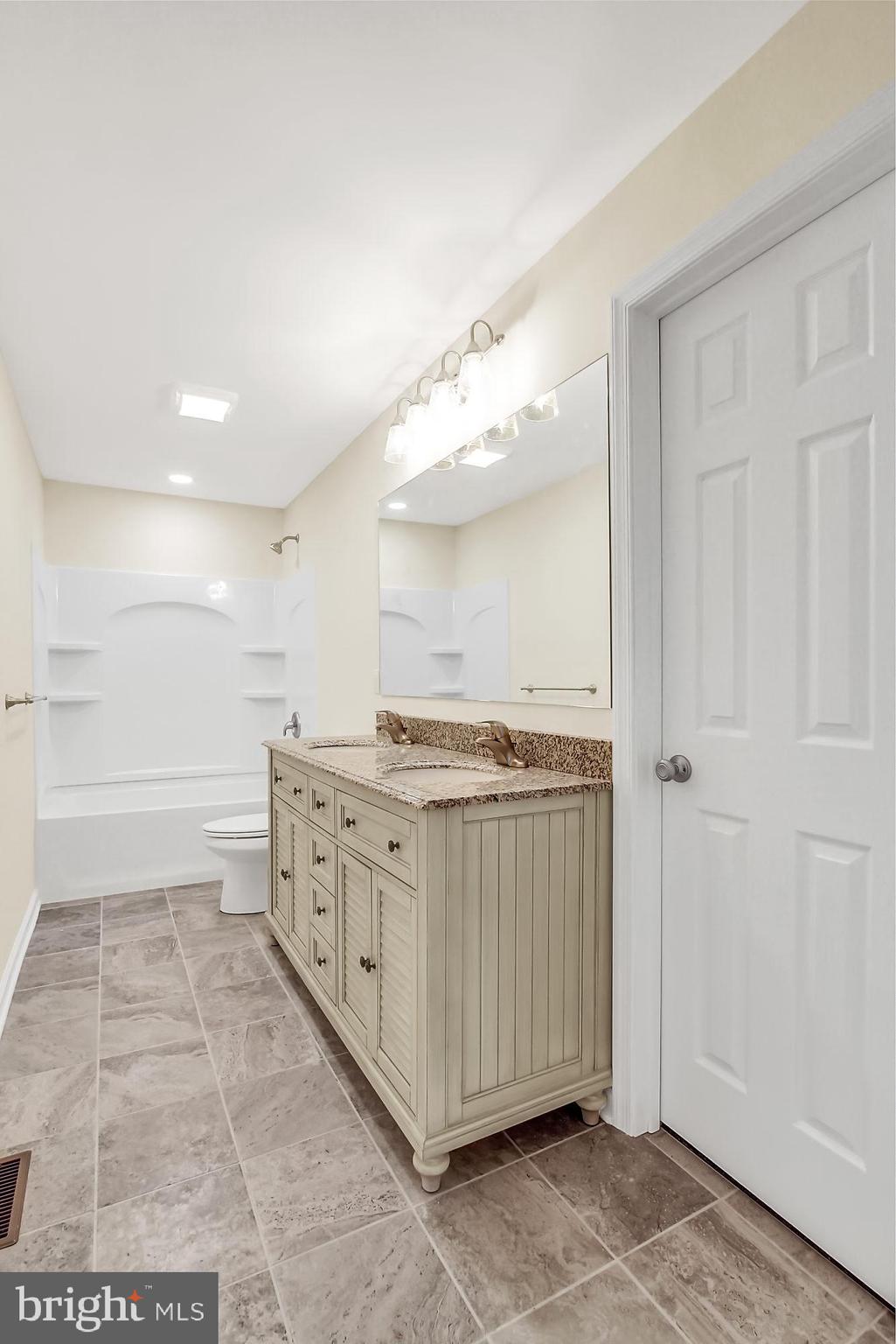 2240 Theodore Road North East, MD 21901 - Photo 19 of 35 Ceramic Flooring & Large Tub Shower in Master Bath