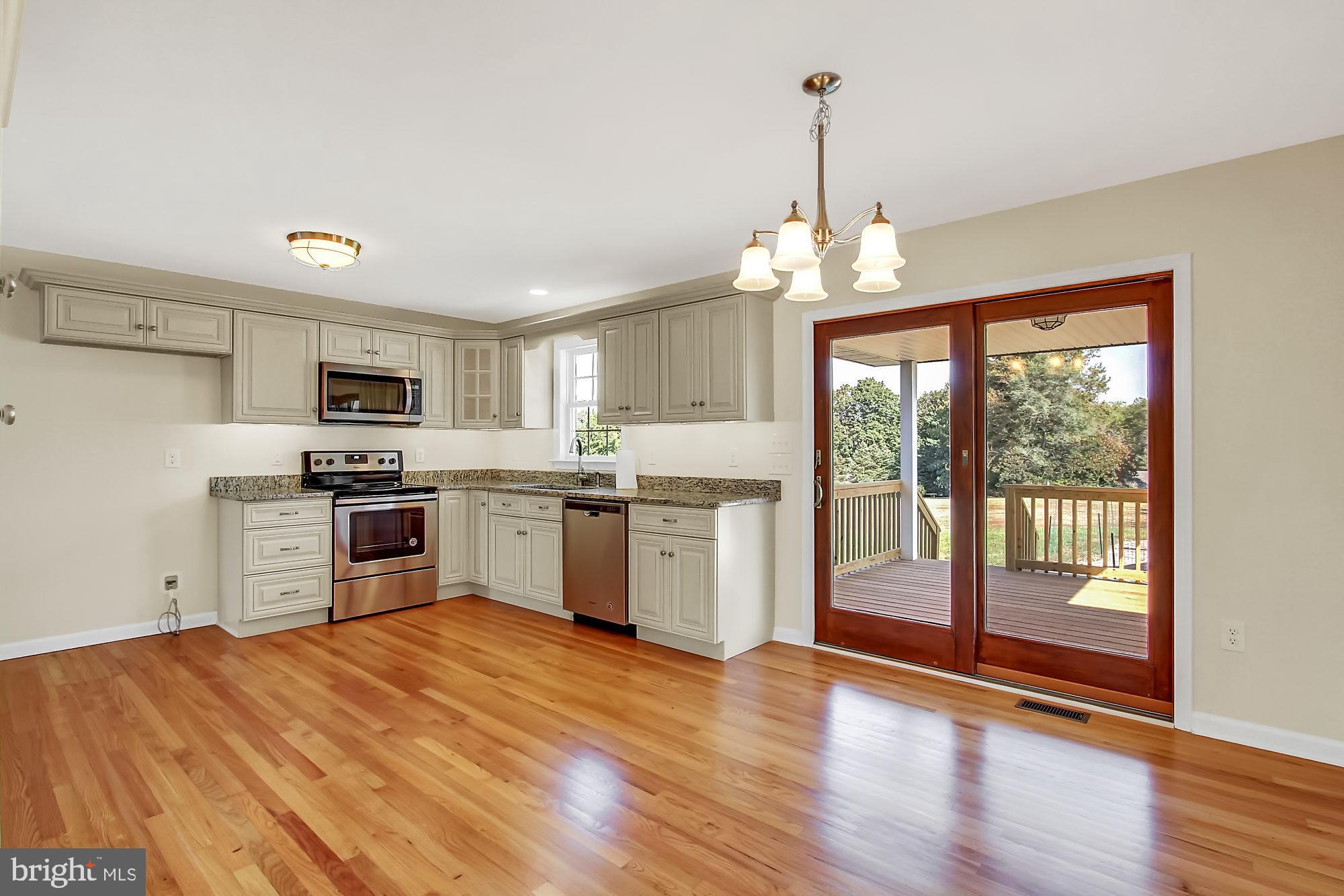 2240 Theodore Road North East, MD 21901 - Photo 3 of 35 Stunning Hardwood floors throughout living area