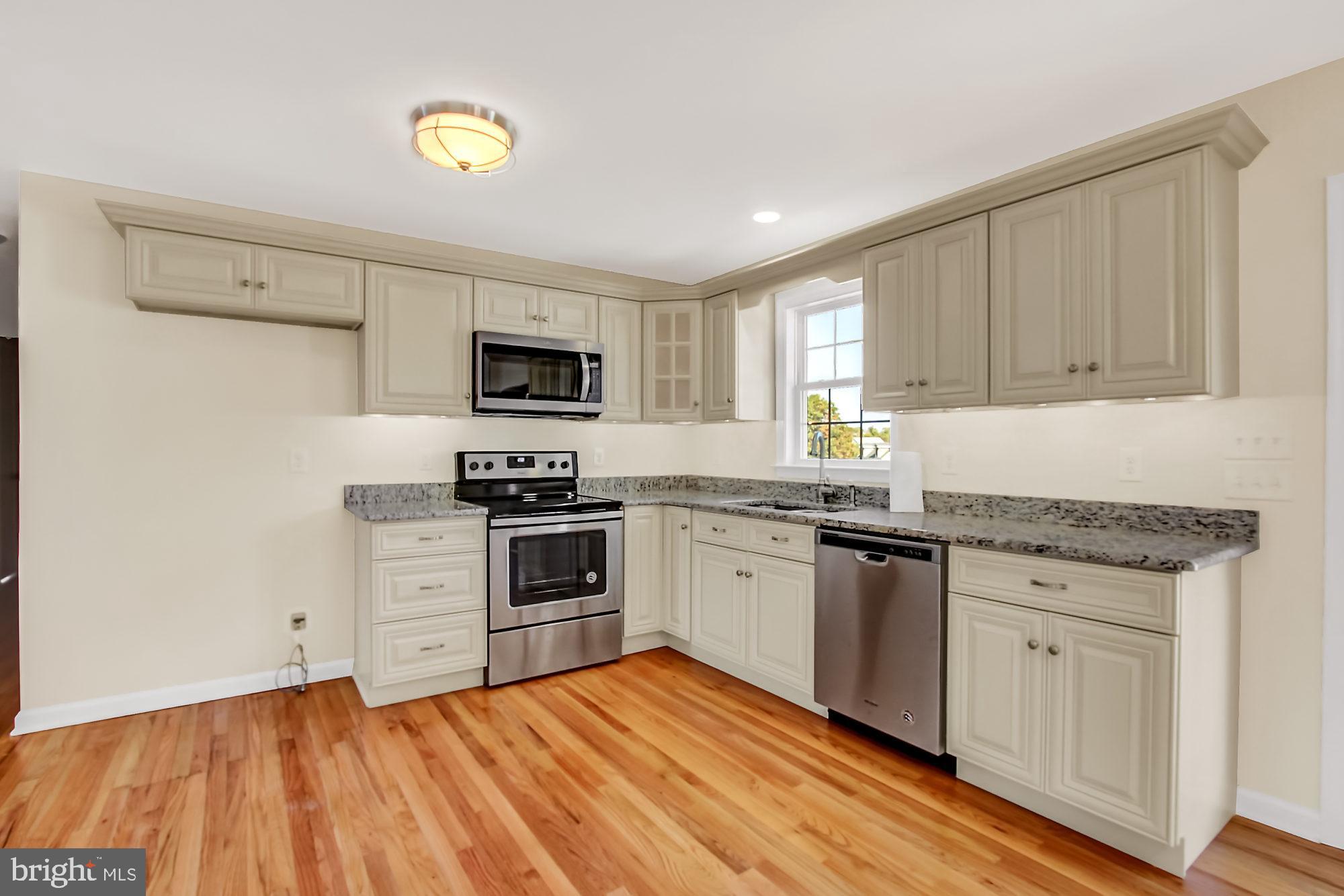 2240 Theodore Road North East, MD 21901 - Photo 4 of 35 Stylish new cabinetry with granite counter tops