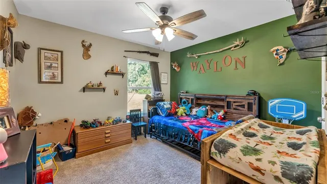 a bedroom with furniture and a bed