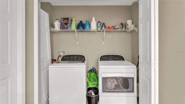 a utility room with dryer and washer