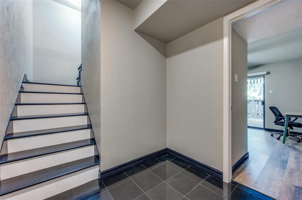 4517 North O'Connor Road, Unit 1138 Irving, TX 75062 - Photo 9 of 24 Stairs with hardwood / wood-style floors