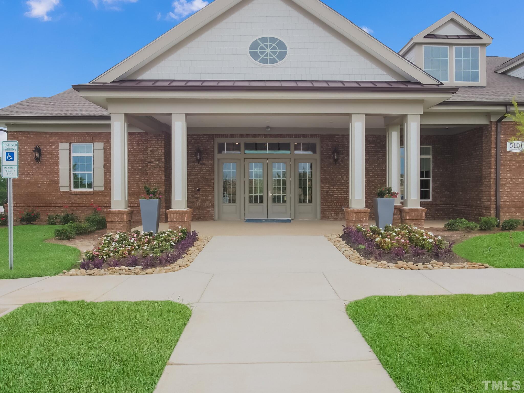 2473 Tonoloway Drive, Unit 334 MEREDITH B Raleigh, NC 27610 - Photo 20 of 29 front view of a house with a yard