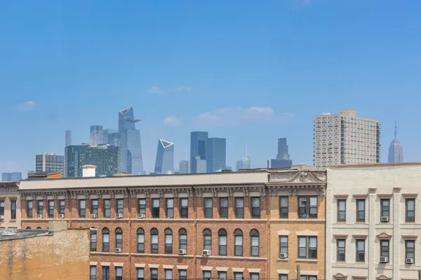 a view of a large building with a city view