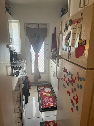 a room with furniture and a wooden floor