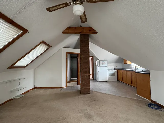 a view of a livingroom with a staircase