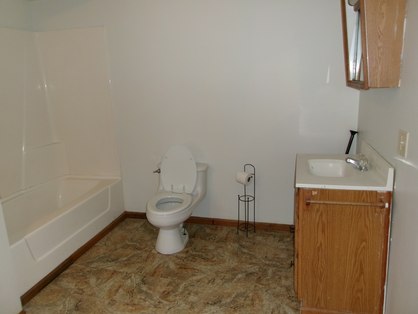 316 7th Street LaSalle, IL 61301 - Photo 6 of 11 a bathroom with a toilet sink and mirror