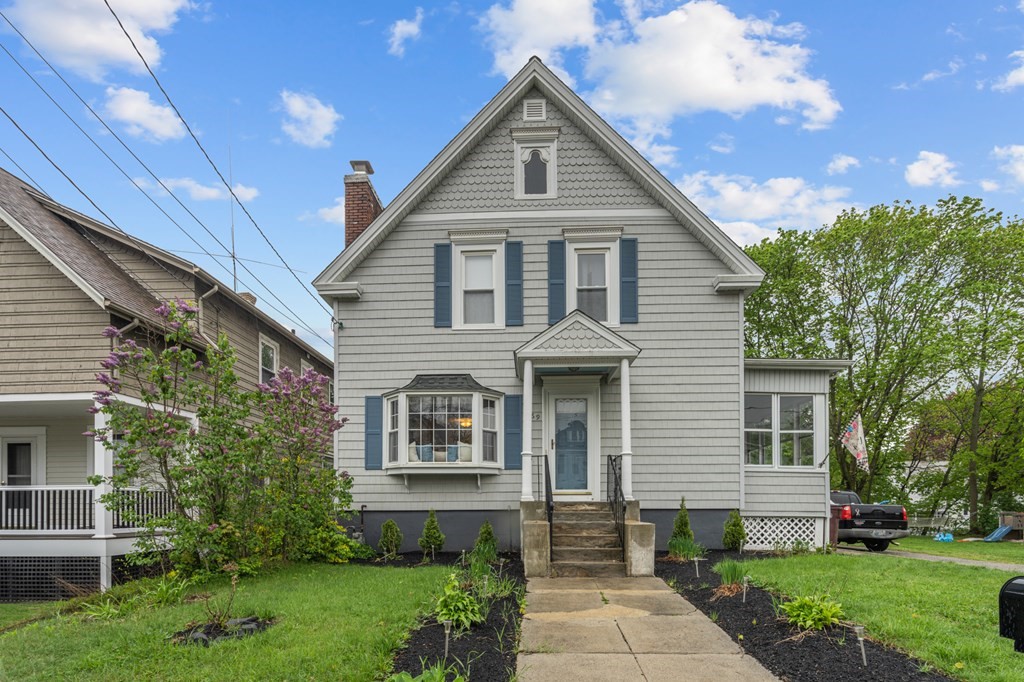 569 Gaskill Street Woonsocket, RI 02895 - Photo 1 of 33 a front view of a house with a yard