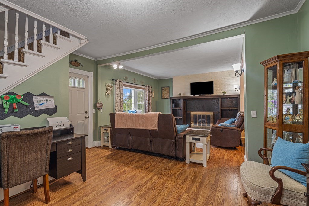 569 Gaskill Street Woonsocket, RI 02895 - Photo 13 of 33 a living room with furniture and a flat screen tv