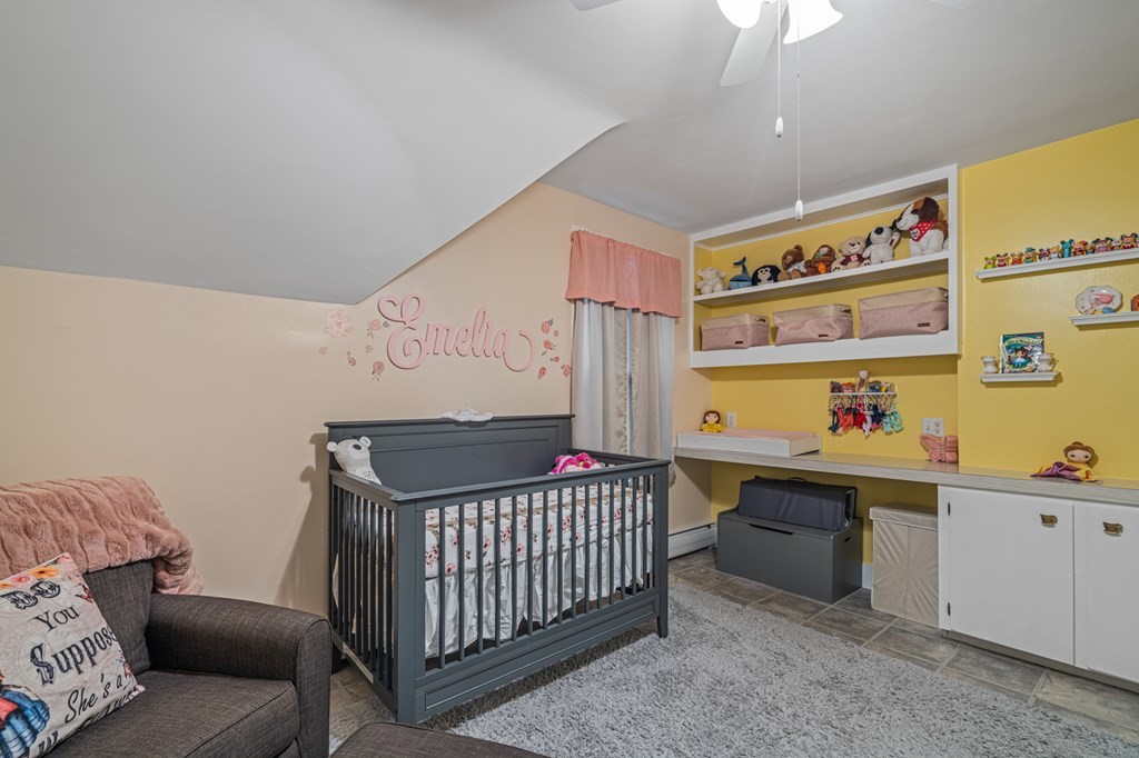 569 Gaskill Street Woonsocket, RI 02895 - Photo 20 of 33 a room with furniture and window