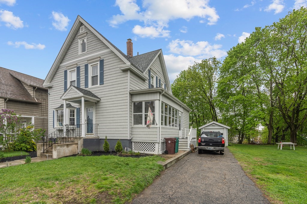 569 Gaskill Street Woonsocket, RI 02895 - Photo 2 of 33 a view of a house with a yard