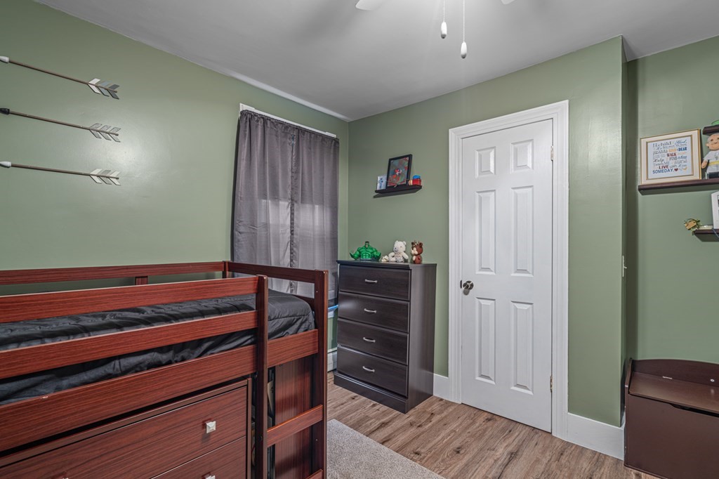 569 Gaskill Street Woonsocket, RI 02895 - Photo 23 of 33 a view of room with closet and wooden floor