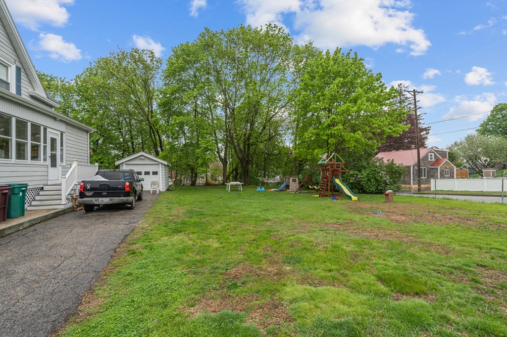 569 Gaskill Street Woonsocket, RI 02895 - Photo 26 of 33 a view of a backyard with a garden