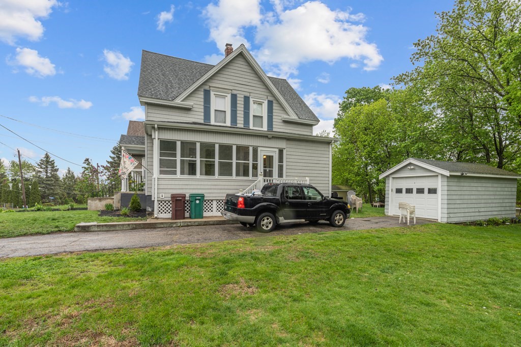 569 Gaskill Street Woonsocket, RI 02895 - Photo 27 of 33 a view of a house with a yard and large trees