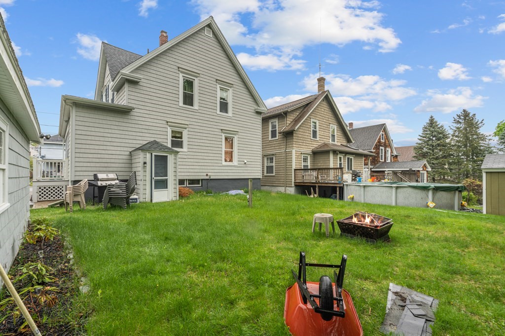 569 Gaskill Street Woonsocket, RI 02895 - Photo 30 of 33 a front view of a house with garden