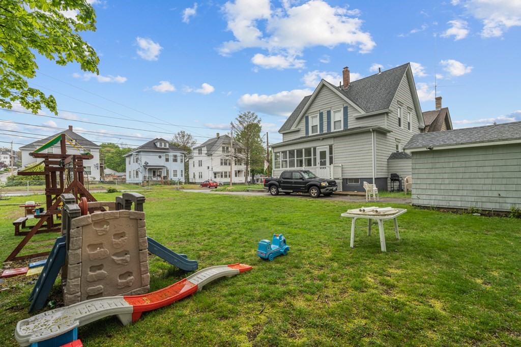 569 Gaskill Street Woonsocket, RI 02895 - Photo 31 of 33 a view of a house with a yard porch and sitting area