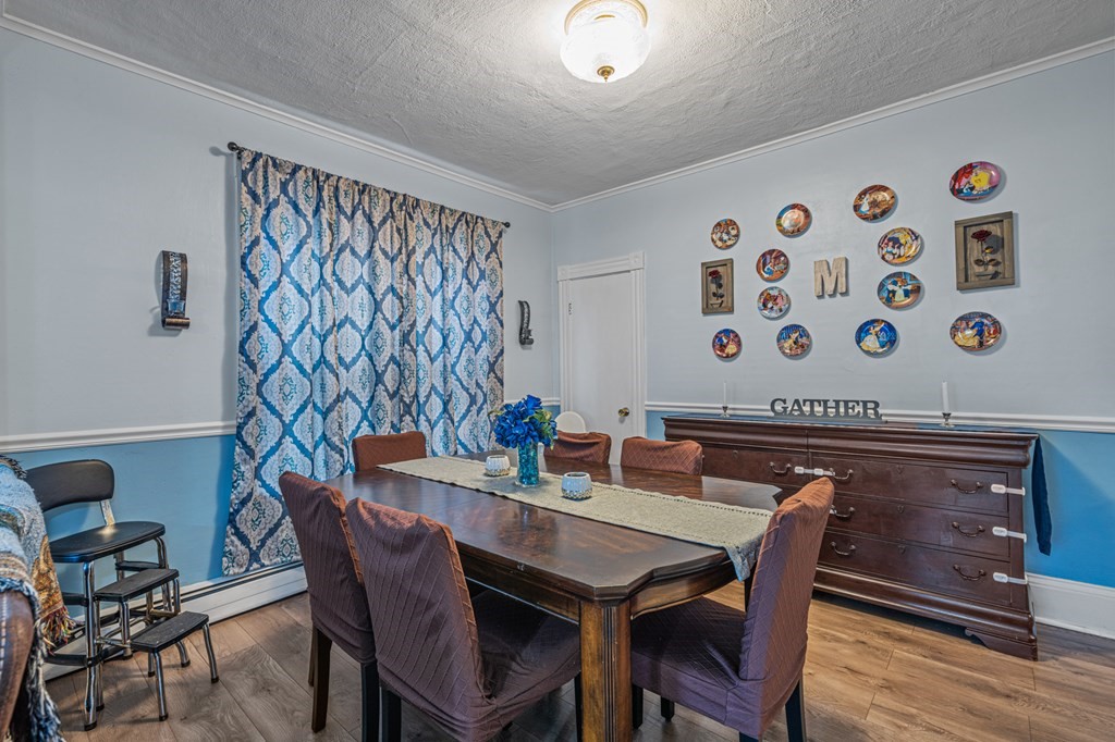 569 Gaskill Street Woonsocket, RI 02895 - Photo 8 of 33 a view of a dining room with furniture