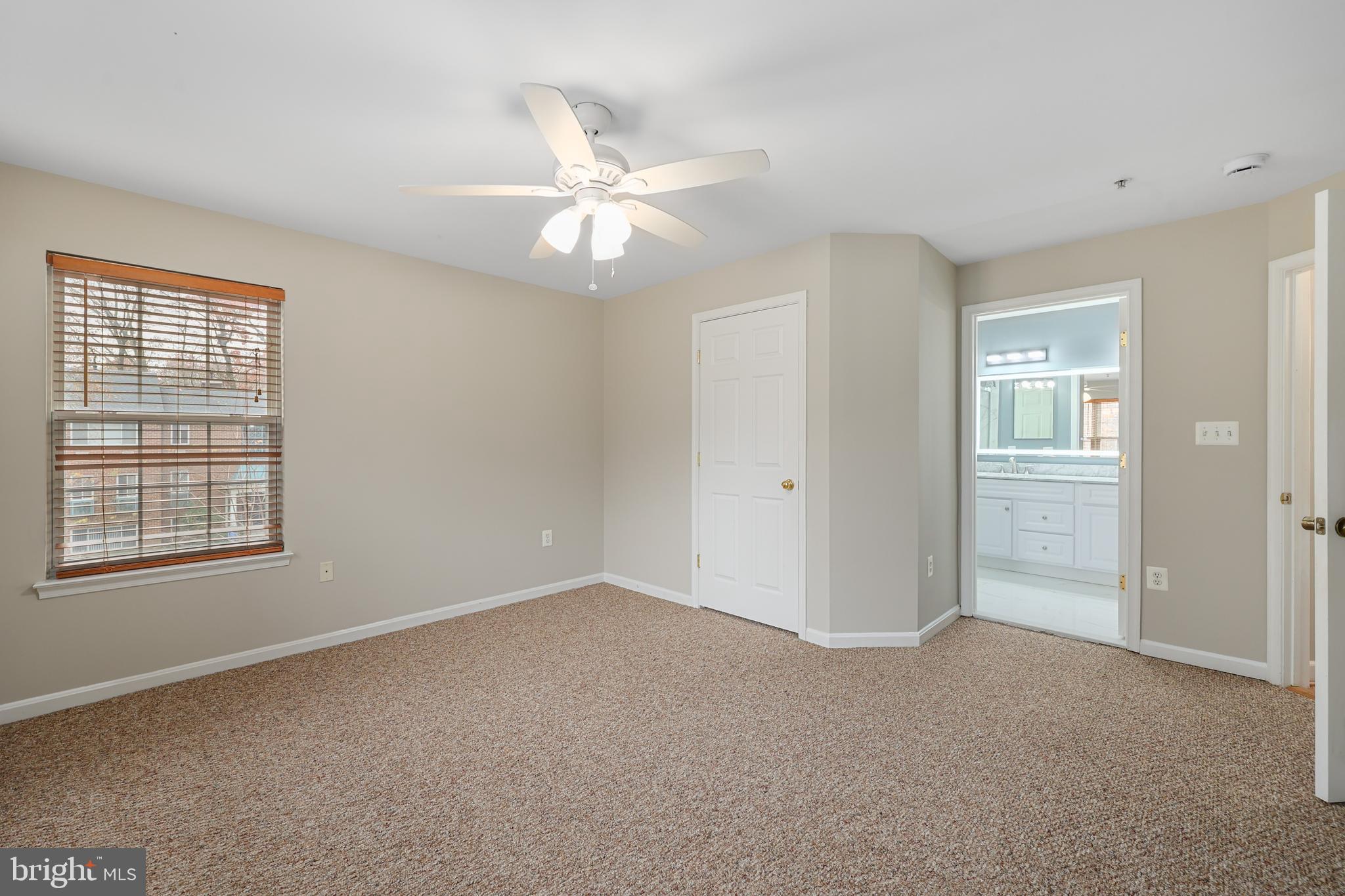 11824 Breton Court, Unit 24A Reston, VA 20191 - Photo 16 of 34 a view of an empty room with a window