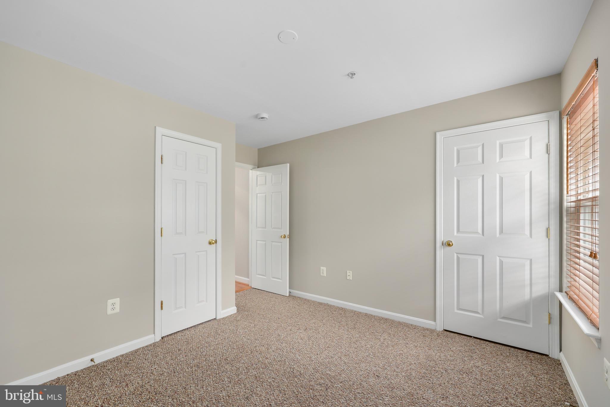11824 Breton Court, Unit 24A Reston, VA 20191 - Photo 22 of 34 a view of an empty room