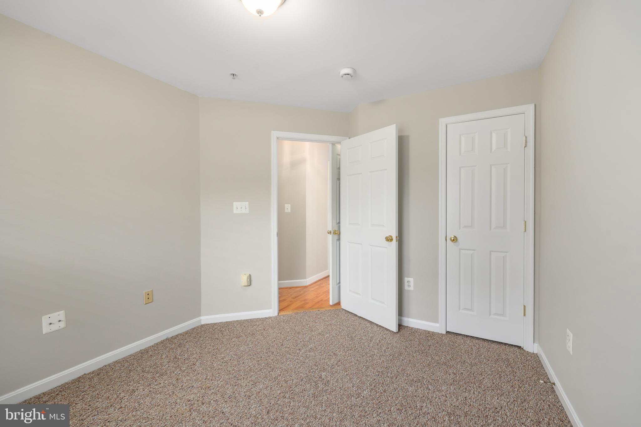 11824 Breton Court, Unit 24A Reston, VA 20191 - Photo 26 of 34 a view of an empty room