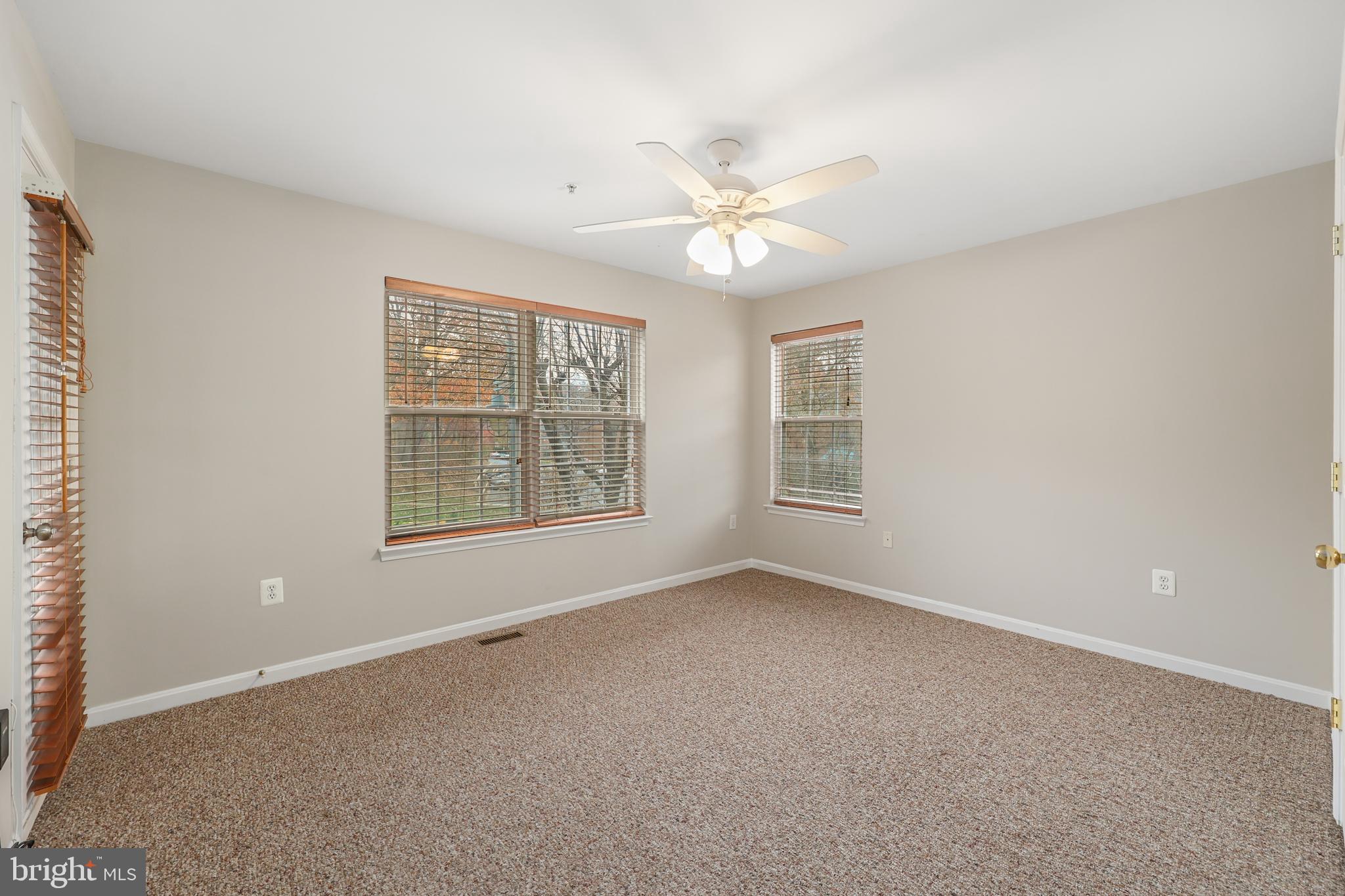 11824 Breton Court, Unit 24A Reston, VA 20191 - Photo 28 of 34 a view of an empty room with a window